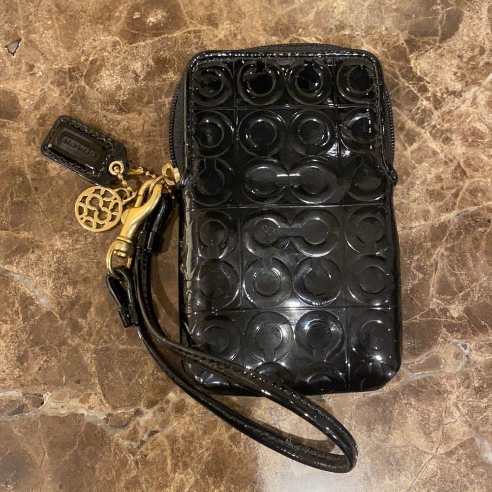 Coach black patent leather phone pouch